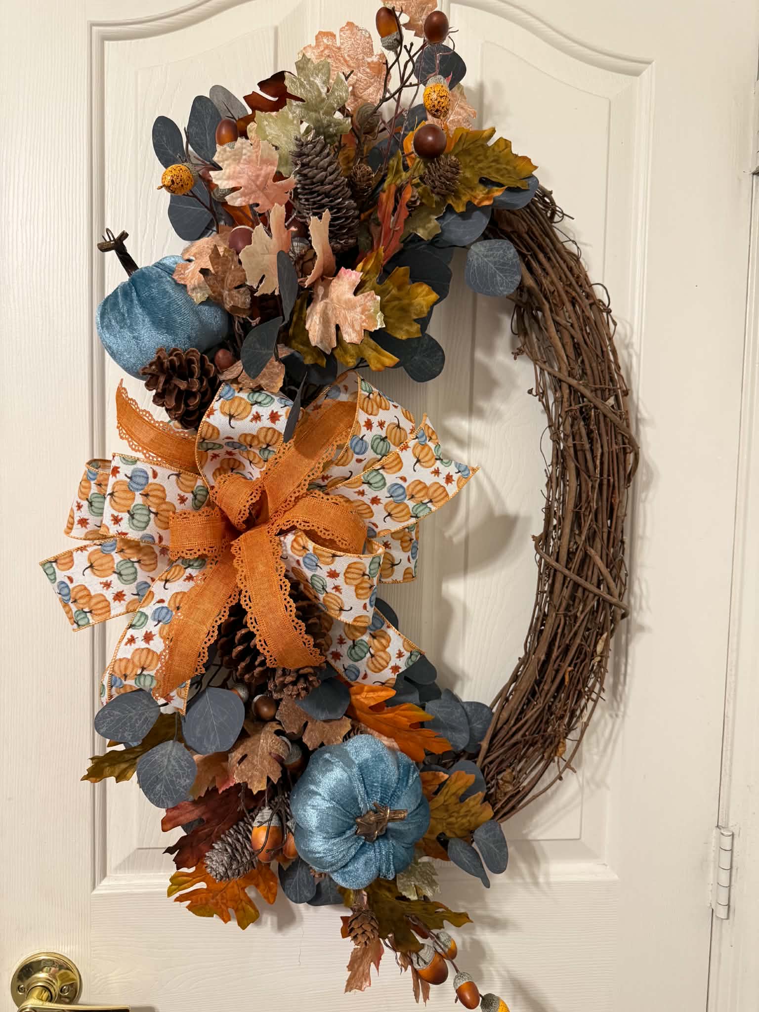 Blue Pumpkin Fall Oval Grapevine Wreath - close up bow and pumpkin