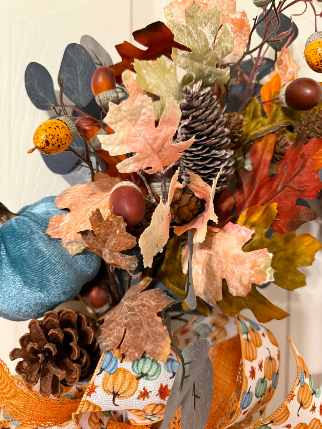 Blue Pumpkin Fall Oval Grapevine Wreath - close up foliage detail