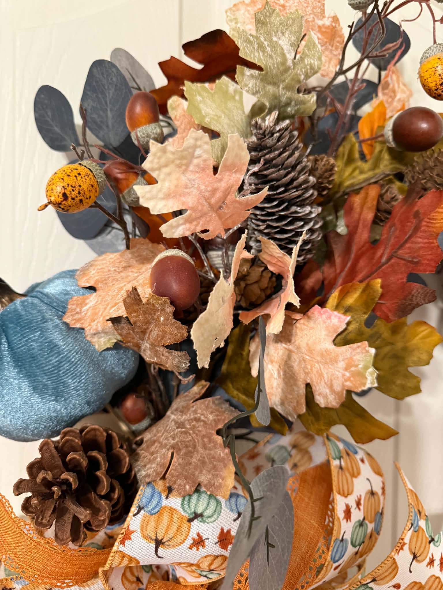 Blue Pumpkin Fall Oval Grapevine Wreath - close up foliage detail