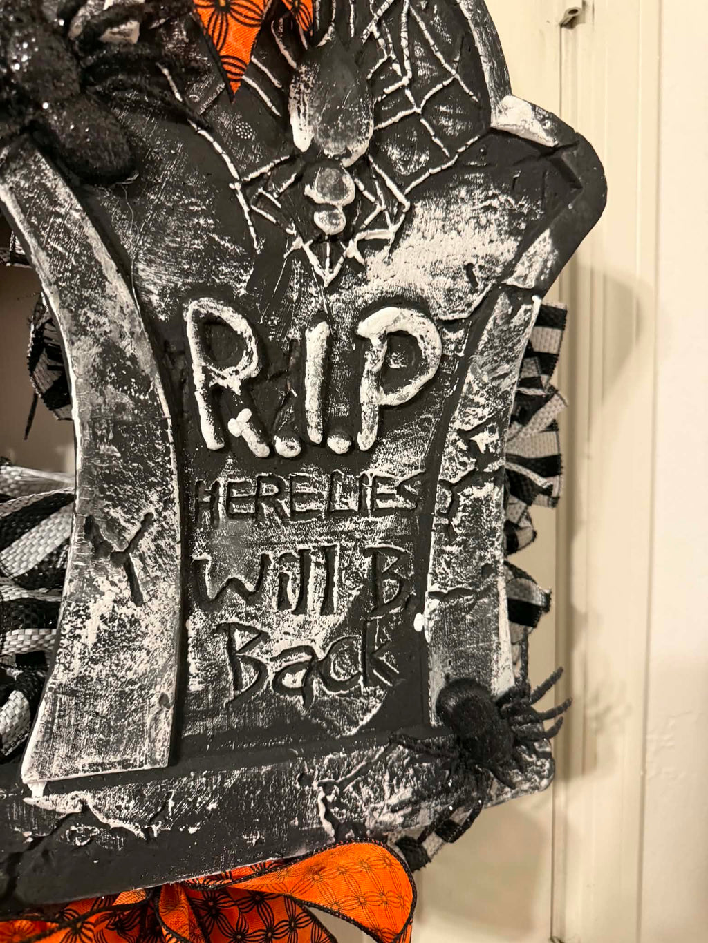 R.I.P. tombstone sign detail close up