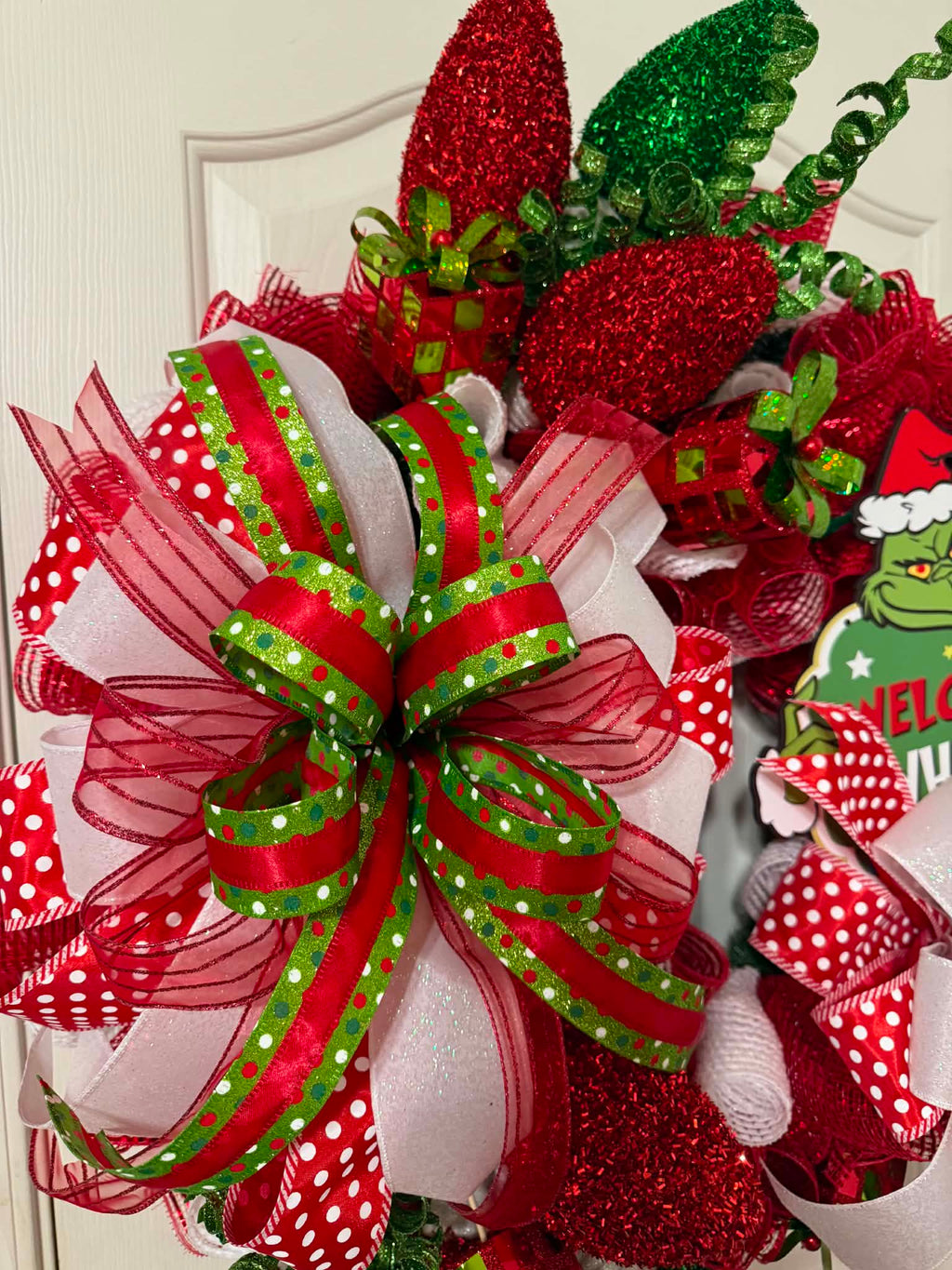 Grinch Welcome to Whoville Wreath - hanging on door
