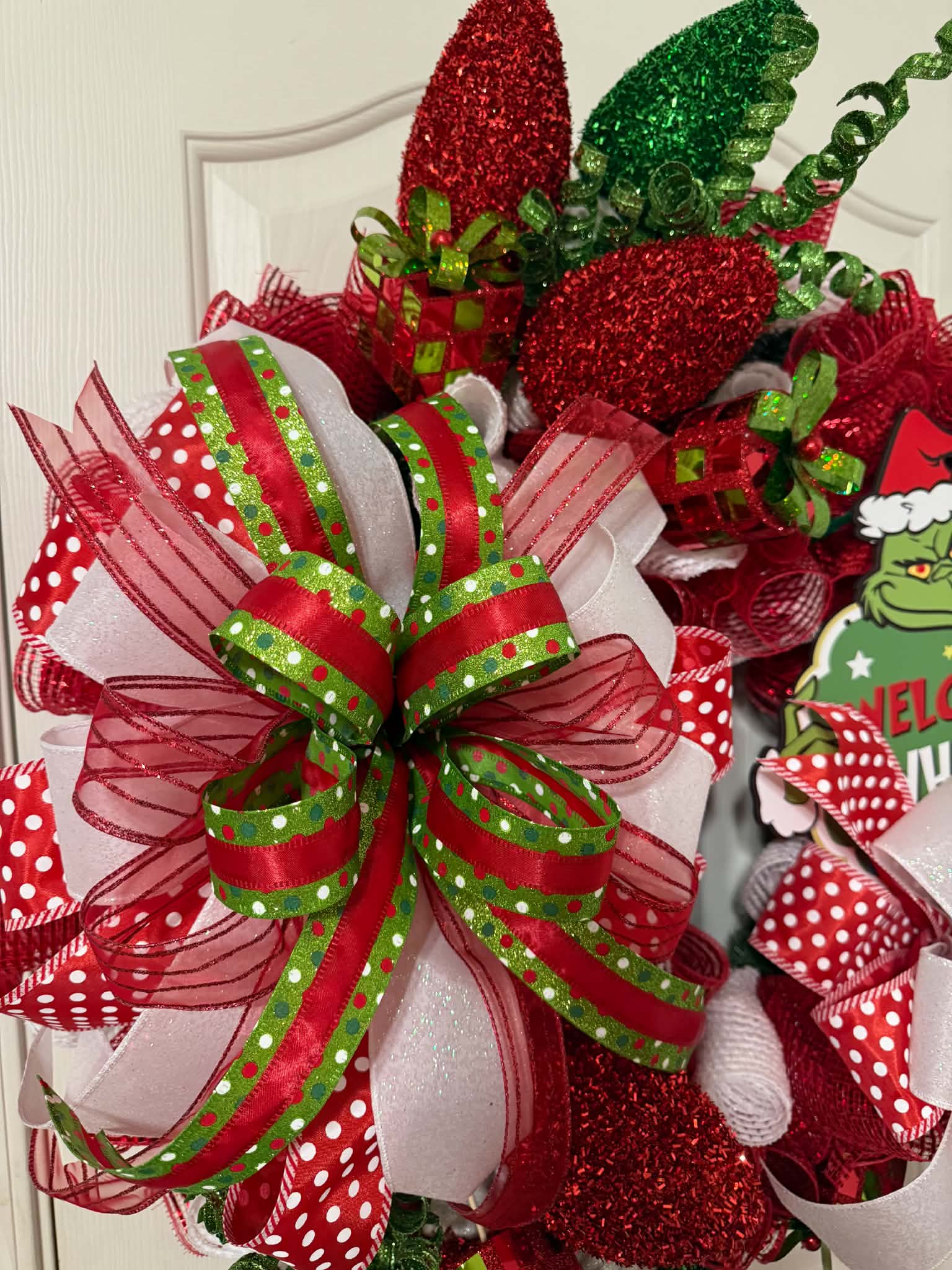 Grinch Welcome to Whoville Wreath - hanging on door