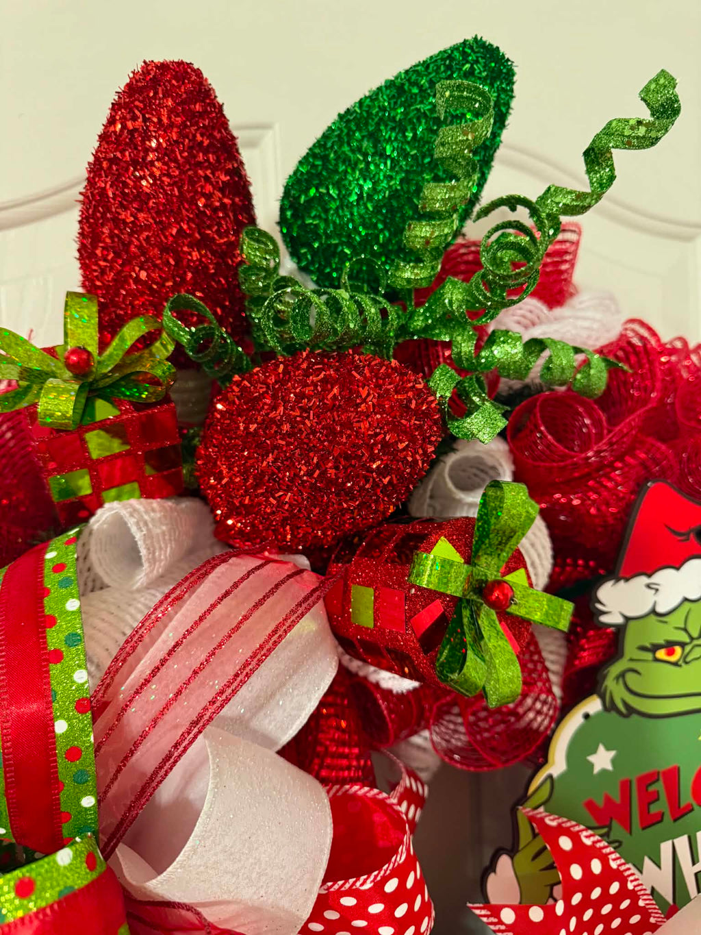 Grinch Welcome to Whoville Wreath - ornament and picks detail